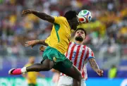 Socceroos Secure World Cup Last 32 Spot with Goalless Draw Against Paraguay