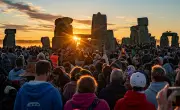 Weekend Photos: Twins Marrying Twins, Solstice Celebrations, Wildfires, and Protests