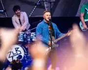 Zach Bryan review: US country star wins over UK with inclusive rodeo show at Anfield