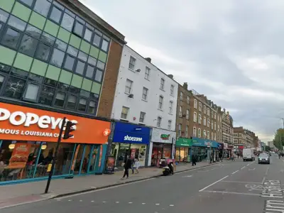 Kilburn crash: pensioner fighting for life, moped driver arrested