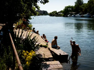 Londoners cool off in Thames at first official bathing spot during fourth heatwave