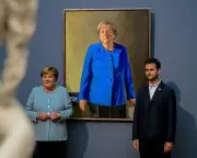 Angela Merkel portrait unveiled in Berlin by French artist