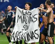Argentina players display Falklands banner after World Cup win over England