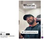 Australian producer's AI-like song tops charts, sparking debate on AI in music