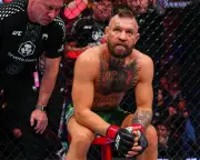 Conor McGregor's UFC return ends in 69 seconds with knee injury