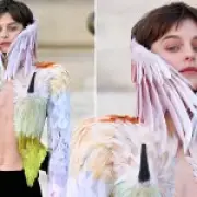 Emma Corrin's Schiaparelli couture jacket with pointed 'nipple' horns steals Paris show