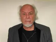 Gary Glitter charged with four historic sexual offences against girl under 14