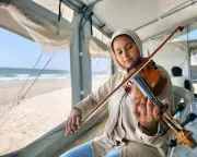 Gaza musicians reopen conservatory in tents after war destroys instruments