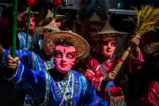 Global Photos: Taoist Festival, Quake Aftermath, Heatwave and More