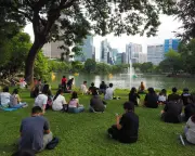 Hundreds gather in Bangkok to 'do nothing' for an hour in protest of capitalism