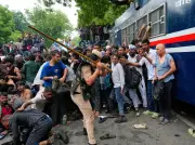 India Protests: Tens of Thousands Demand Minister's Resignation Over Exam Leaks