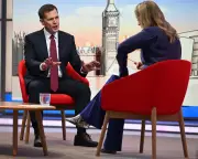 Jenrick Defends Farage Amid Freebies Scandal, Claims Media Plot