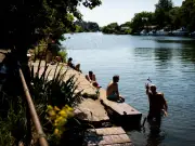 Londoners cool off in Thames at first official bathing spot during fourth heatwave