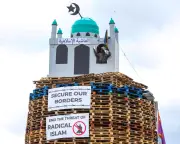 Man arrested over mosque effigy on loyalist bonfire in Northern Ireland