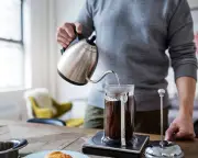 Master French press coffee: scales, grind, water, and patience key