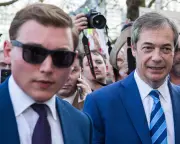 Nigel Farage urged to seek forgiveness over school racial abuse claims