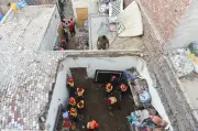 Pakistan roof collapse kills 14 children at tutoring centre in Lahore