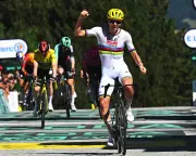 Pogacar takes yellow jersey as Tour de France battles wildfires and 40C heat