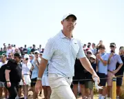 Rory McIlroy's Open hopes in balance after mixed second round