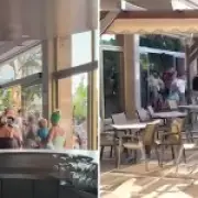 Sunbed stampede in Spain as holidaymakers race for pool spots after hour-long queue
