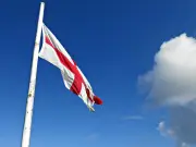 Sutton flag removal row costs £27k, council considers injunction