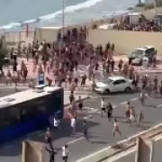 Thousands of migrants storm Spanish beach in Ceuta, overwhelm police