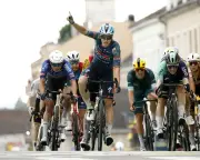 Tim Merlier claims Tour de France hat-trick on stage 12 as crash hits sprinters