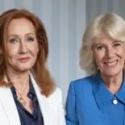 Trans activists rally against Queen Camilla's meeting with JK Rowling