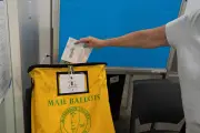 US judge blocks Trump bid to limit mail-in voting in latest setback
