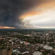 Wildfires force 80,000 to flee homes in France and Spain, some by boat