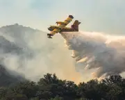 Wildfires rage across southern Europe, thousands flee homes