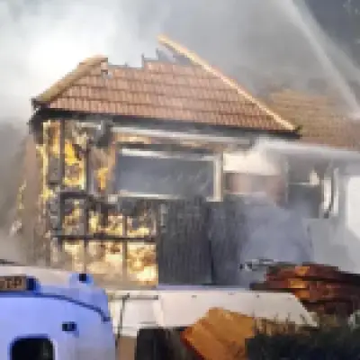 Car and roof destroyed in New Malden house fire in south west London