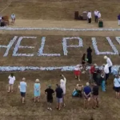 Kent villagers spell out 'help us' with 6,000 plastic bottles after week without water