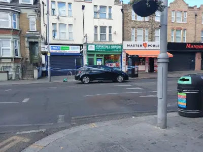 Leyton stabbing: Police cordon on High Road as air ambulance lands