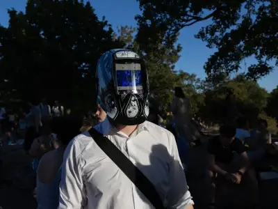 Londoners flock to parks for best solar eclipse in decades