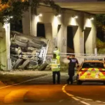 Lorry plunges 20ft from M3 bridge in Hampshire, driver trapped