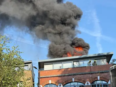 Shoreditch fire: black smoke over London, road closed