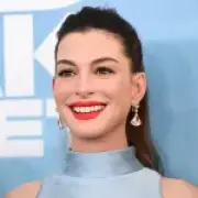Anne Hathaway's Denim Maternity Look Sparks Debate at Premiere