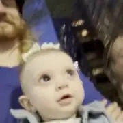 Baby born blind sees city lights for first time after surgery