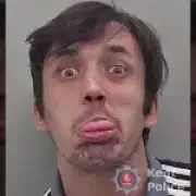 Bully who stuck tongue out for mugshot jailed for strangling woman