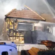 Car and roof destroyed in New Malden house fire in south west London