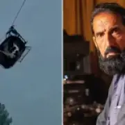 Dad's terror as son trapped 900ft up in broken cable car
