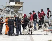 Dinghy with 173 migrants capsizes in Channel after engine fire