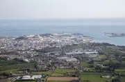 Elliott Joins Hedge Fund Rush to Jersey as UK Tax Looms