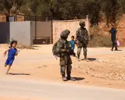Israeli troops force families from West Bank homes amid settler siege