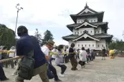 Japan crowds pull 360-tonne Hirosaki Castle keep with ropes