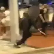 Machete-wielding teen chases man through crowded Birmingham street