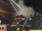 New Malden house fire: 70 firefighters battle blaze as home destroyed