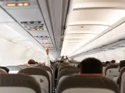 Passenger Refuses Seat Swap, Shocked to Find 'Son' Is 20
