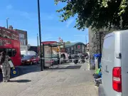 Peckham bus stop cordoned after glass bottle attack injures man